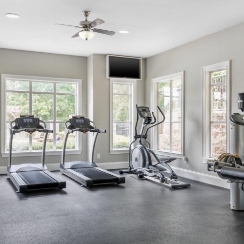 Get your workout on a room with exercise equipment