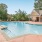 a swimming pool with access to restroom