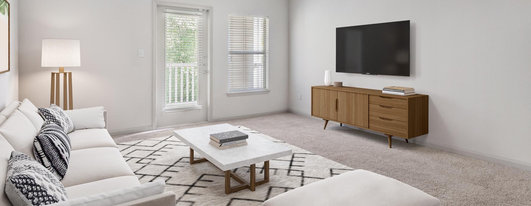 a living room with a tv and couches