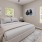 bedroom with side tables and lamps