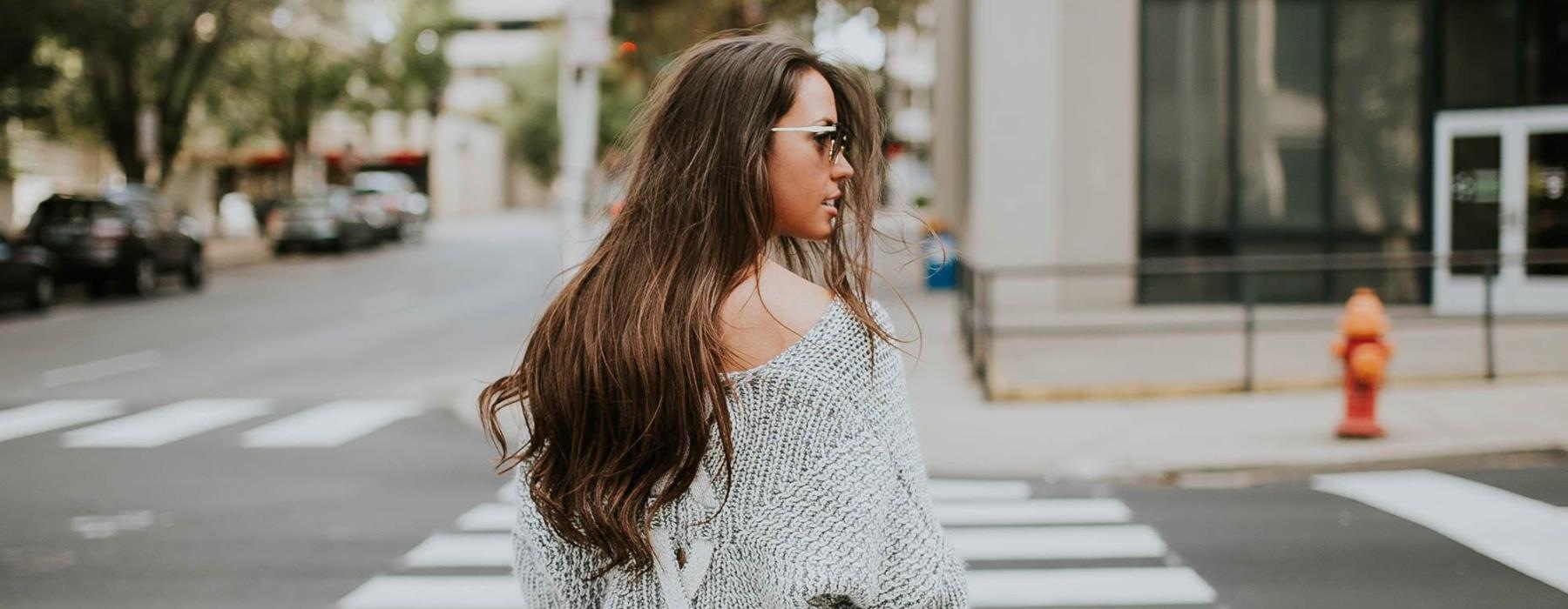 a person walking in a crosswalk