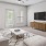 a living room with a tv and couches