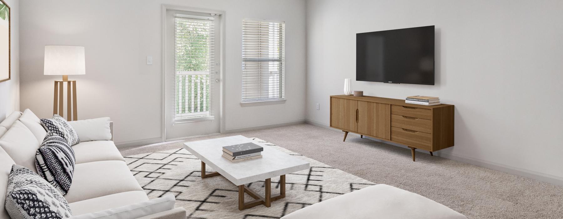 a living room with a tv and couches