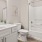 a bathroom with a tub sink and toilet