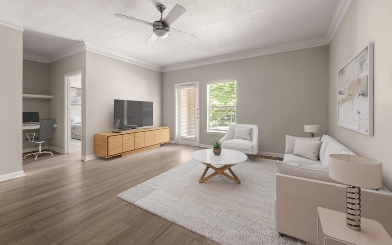 a living room with a wood floor and neutral decor